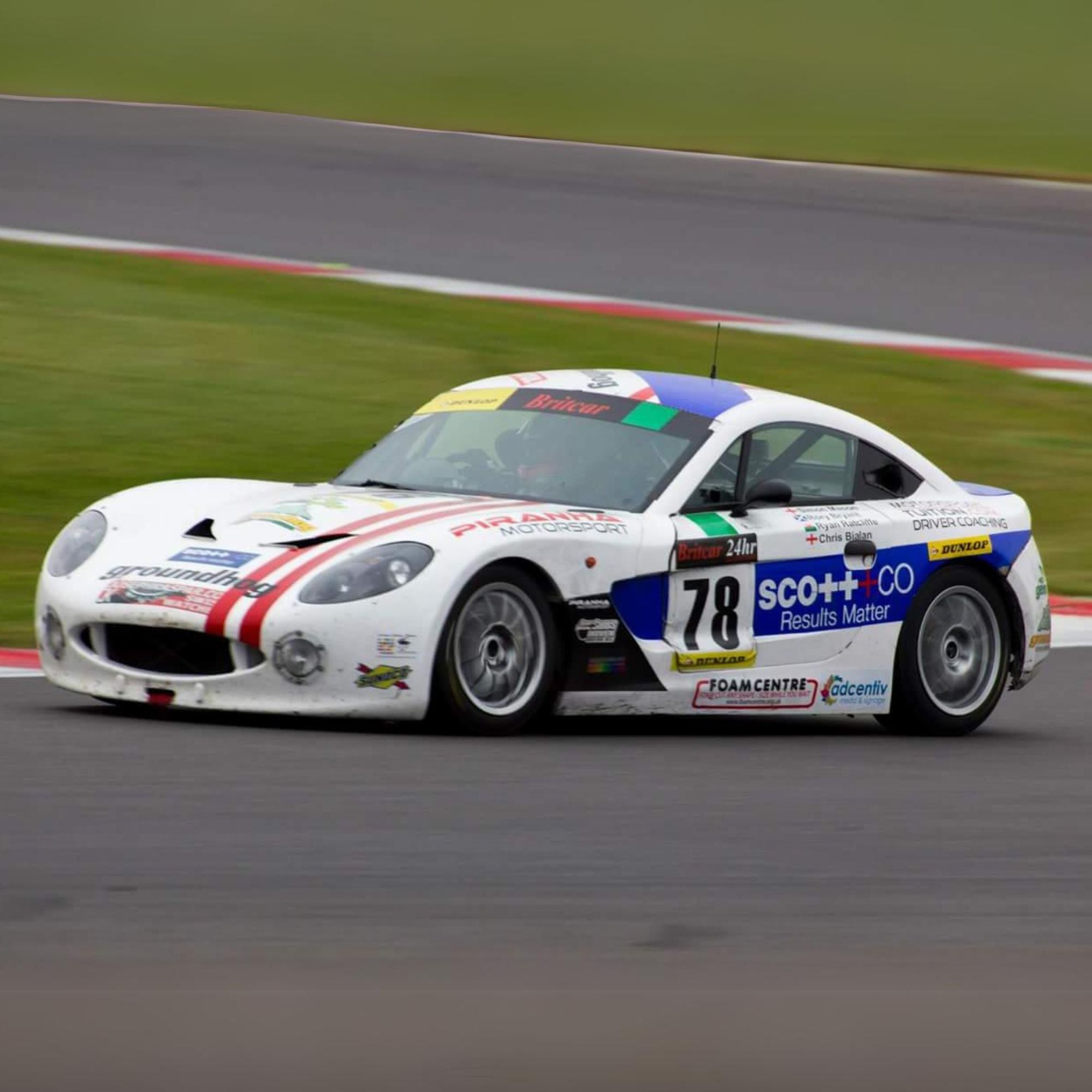 White Piranha Motorsports race car on track