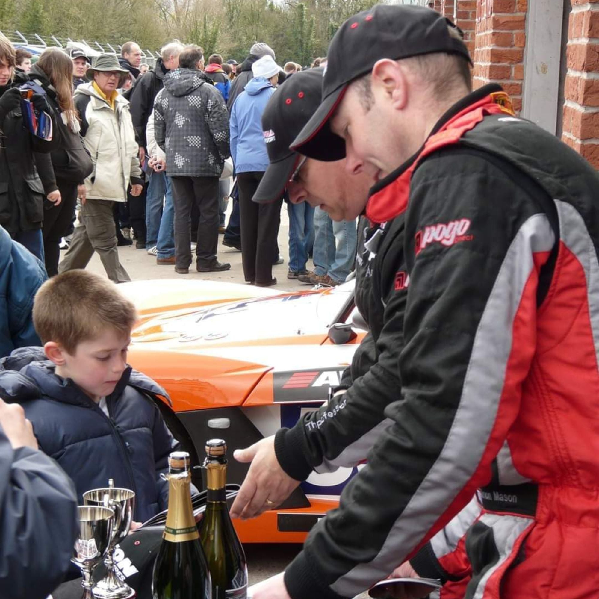Chris Bialan and Simon signing autographs